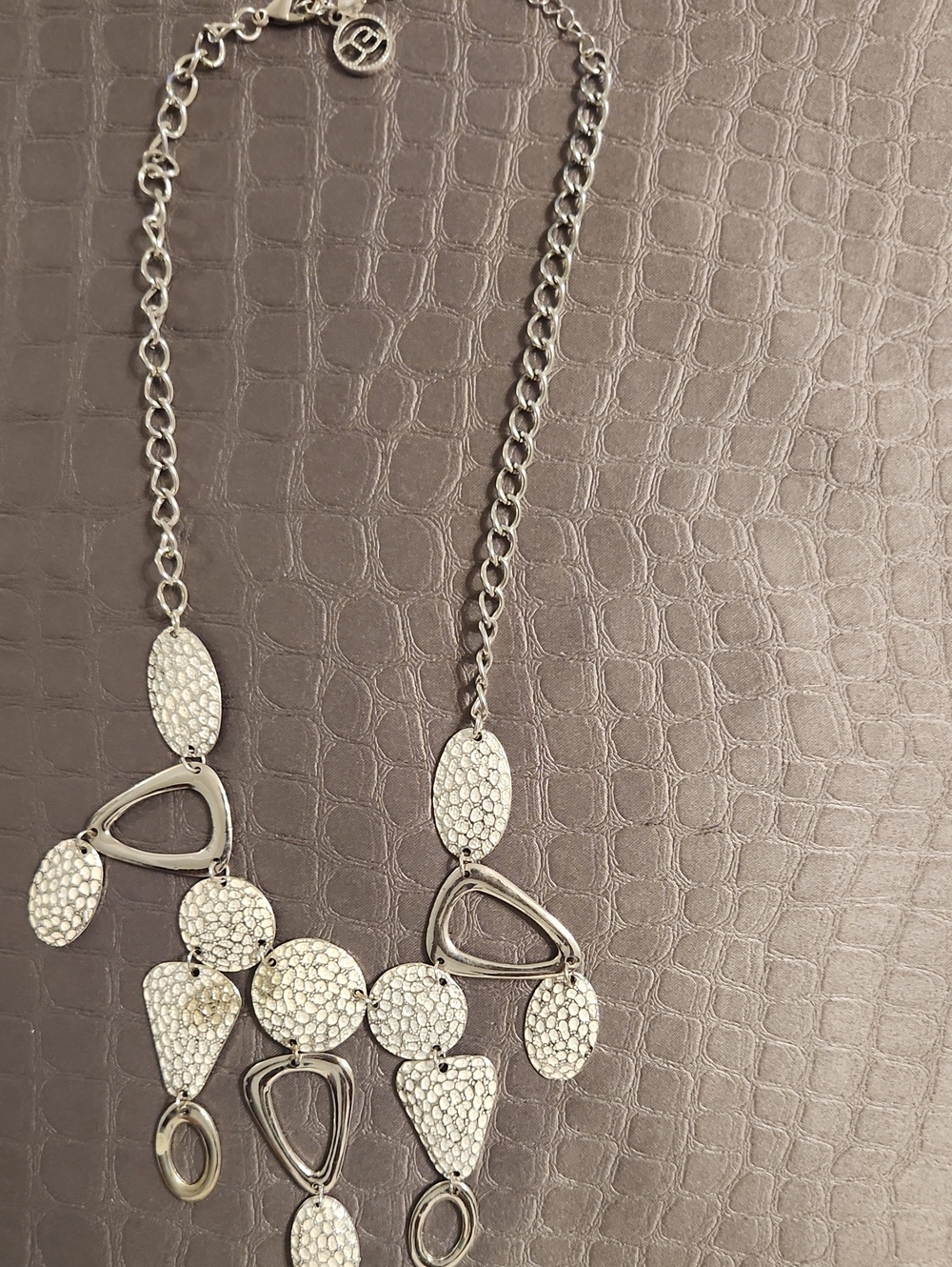 Silver-Tone Statement Necklace with Textured Oval & Geometric Drops